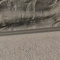 Winding Road Along Massive Rocky Cliff Featuring Double Yellow Lines And Gravel Ground