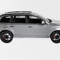 Silver SUV Car With Roof Rack Red Accent Wheels And Modern Exterior Design