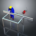 Man wearing blue uniform with yellow safety helmet welding metal frame near red welding machine