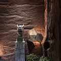 Modern Restaurant Interior Design With Textured Rock Wall Water Fountain And Green Plants