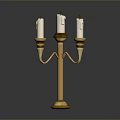 Decorative Golden Candelabra With Five White Candles And Ornate Base Design