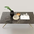 Elegant Coffee Table With Black Marble Top Golden Legs And Decorative Vase Tray Bowl Glasses