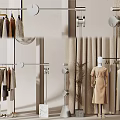 Clothing Rack In Fashion Retail Display With Mannequins And Clothes