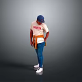 Man in white ERUDITE T-shirt blue cap brown belt blue jeans white sneakers gray background