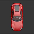 Red Sleek Sports Car With Shiny Exterior Design Alloy Wheels And Reflective Floor Surface