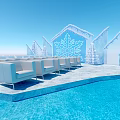 Frozen Ice Sculpted Building With Blue Swimming Pool And White Outdoor Sofas