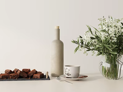 Ornamental Decor Set With Gray Bottle White Flower Vase Brown Squares White Cup Green Leaves 3d model