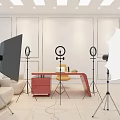 Modern Public Office Space With Red Desk Yellow Chair Tripod Mounted Ring Lights And Sofa