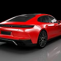 Red Sports Car With Modern Sleek Body And Black Alloy Wheels Design
