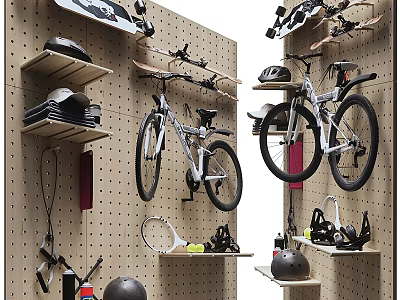Organized Wall Mounted Sports Equipment Including Bicycles Helmets And Tennis Rackets On Pegboard Wall 3d model
