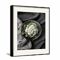 Organic Fresh Cauliflower With Green Leaves On Ceramic Plate And Gray Cloth