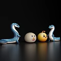 Decorative Ornament Set With Blue Snake Shaped Figures White And Yellow Smiley Balls