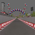Train Traveling On Track With Red White Blue Balloon Arch MOTUL Signs And Grandstands