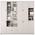 Modern White Bookcase With Multiple Compartments And Drawer Storage Featuring Books Files Globe And Plant