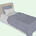 Modern Single Bed with Beige Headboard Gray Duvet and White Pillows
