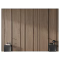 Dark Wood Grain Wall With Vertical Lines And Black Cabinets On Both Sides Holding Decorative Items