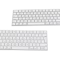 Two White Computer Keyboards Featuring Standard Key Layout And Smooth Surface