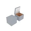 Gray Upholstered Storage Ottoman with Metal Legs and Open Storage Compartment Design