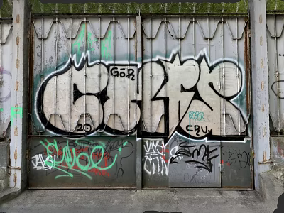 Urban Grille Fence Adorned with Colorful Graffiti and Spray Paint Art 3d model