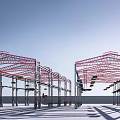 Industrial Factory Building Featuring Red Steel Frame Structure And Cranes In Spacious Area