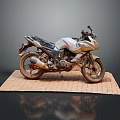 Silver Sporty Motorcycle Parked On Brick Platform With Simple Gray Background
