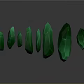 Green Crystals in Various Shapes with Glossy Surface on Gray Background
