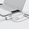 Laptop and Smartphone Connected via Multi Port USB C Hub for Digital Device Charging