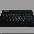 Classic Black Microdata Terminal Electronic Device With Colored Keys And Keyboard