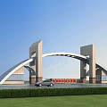 Modern Entrance Gate with Arch Design Tower Structures Red Signs Green Lawn and Cars