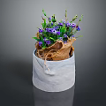 Vibrant Purple Flowers in White Pot with Burlap Wrap and Green Foliage
