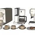 Various Modern Kitchen Appliances Including Coffee Makers With Cups And Cookies