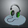 Wired Headphones With Green Earcups Silver Headband And Cable On Blue Octagonal Base