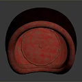 Red Patterned Oval Shaped Chair With Wooden Legs And Golden Accents