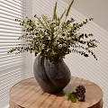 Unique Textured Vase with Dried Flowers on Wooden Round Table by Window Blinds