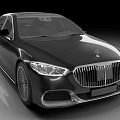 Mercedes Black Luxury Sedan with Sleek Front Grille Headlights and Smooth Body Lines