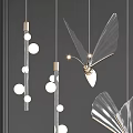 Modern Chandeliers With Glass Metal Butterfly Wing Cone Sphere Shapes Hanging On Minimalist Background