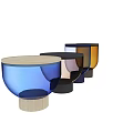 Colorful Ceramic Vessels With Rounded Bodies And Colored Lids For Home Decor