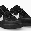 Black Low Top Sneakers With White Nike Swoosh Black Laces Black Sole And Orange Accents