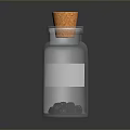 Transparent Glass Bottle With Cork Stopper White Label And Black Granules Inside