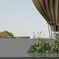 Floral Installation Featuring Yellow Hot Air Balloon with Flowers and Green Plants at Base