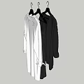 White and Black Clothes Hanging on Hangers with Long Sleeves and Simple Style