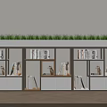 Modern Bookcase with Multiple Compartments Holding Books Decorative Items and Green Grass on Top