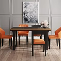 Modern Dining Table Set with Black Tabletop Orange Chairs Vase Flowers and Wall Art in Interior