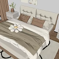 Modern Minimalist Bedroom Interior With Beige Bedding Decorative Paintings And Wooden Floor Rug