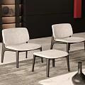 Two Light Gray Upholstered Accent Chairs With Ottoman In Modern Interior Rug And Decorative Vases