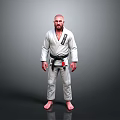 Man in White Judo Uniform with Black Belt Standing Against Gray Background