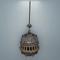 Ornate Hanging Metal Stove With Intricate Openwork Design And Flame Light