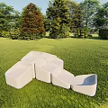 Stylish Modern White Outdoor Chairs Arranged On Green Grass With Trees