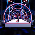 Tobacco and Liquor Store Interior With Arched Structures Colorful Lighting and Customers