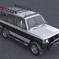 Silver And Black Off Road Car With Roof Rack Large Bumper And Off Road Tires